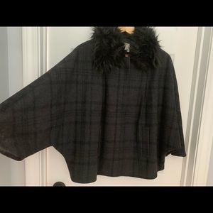 Black / gray coat with fur collar.